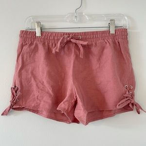 Pink shorts with ties on the sides, size small